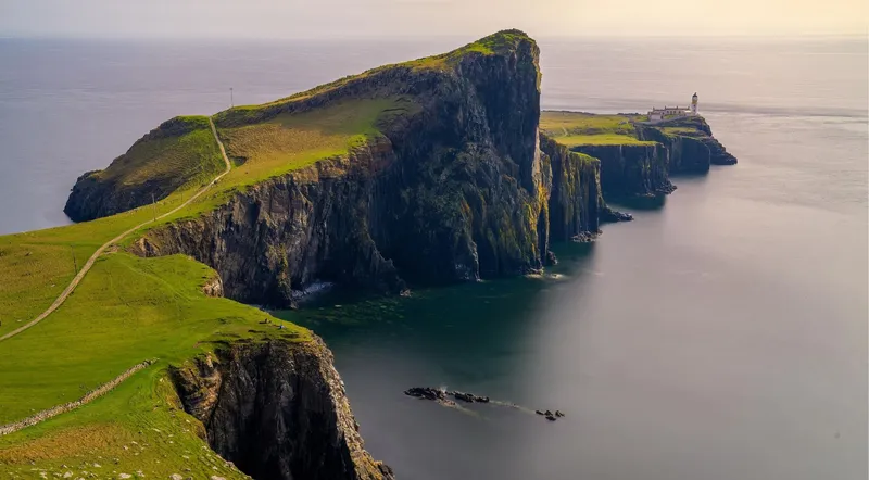 Neist Point Lighthouse on the Isle of Skye at golden hour